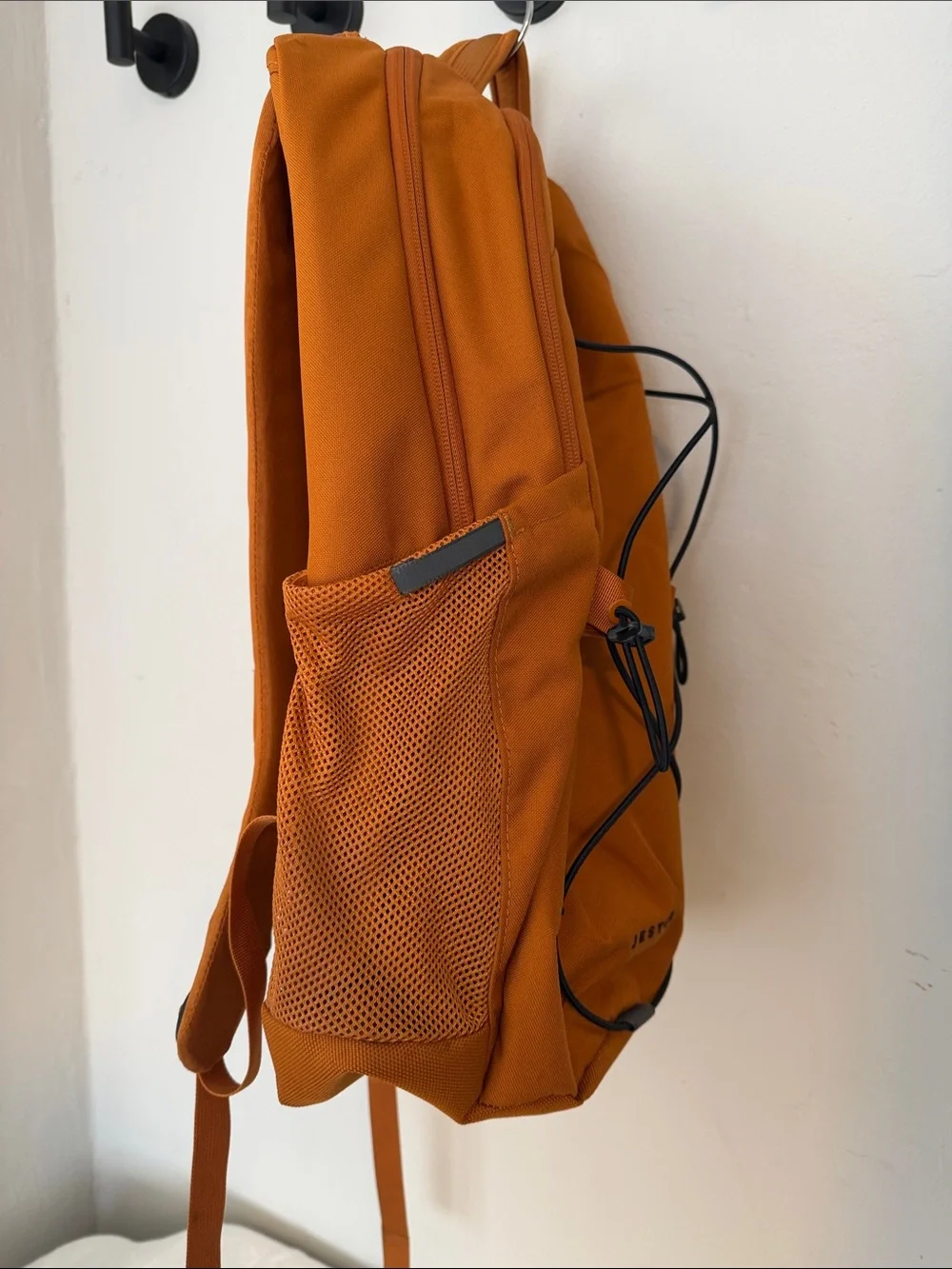 North Face Jester Backpack in burnt orange & black accents Excellent Condition
